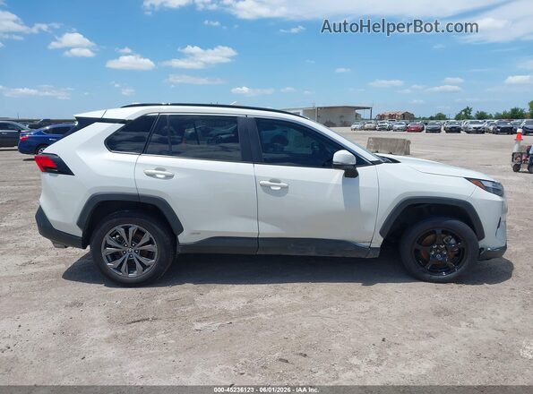 2T3B6RFVXNW037669 2022 TOYOTA RAV4 HYBRID White Rear interior view