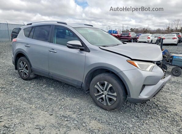 2T3BFREV1GW485271 2016 TOYOTA RAV4 Серебряный Передняя правая четверть