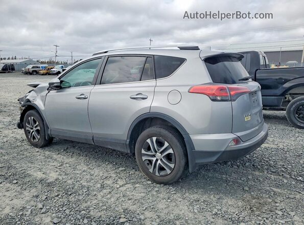 2T3BFREV1GW485271 2016 TOYOTA RAV4 Серебряный Задняя левая четверть