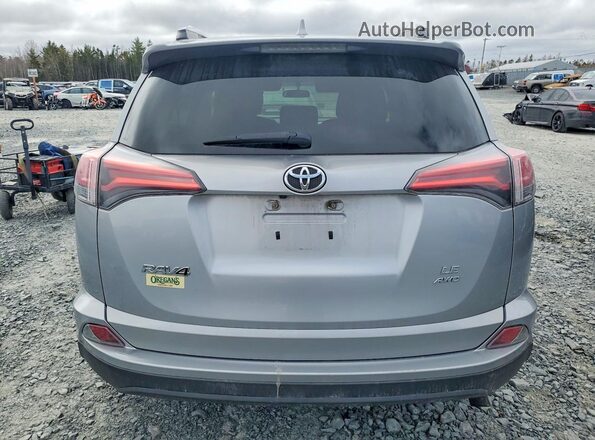 2T3BFREV1GW485271 2016 TOYOTA RAV4 Серебряный Вид сзади
