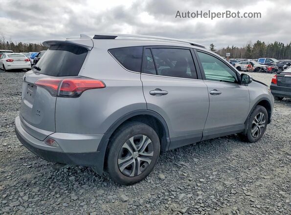 2T3BFREV1GW485271 2016 TOYOTA RAV4 Серебряный Задняя правая четверть