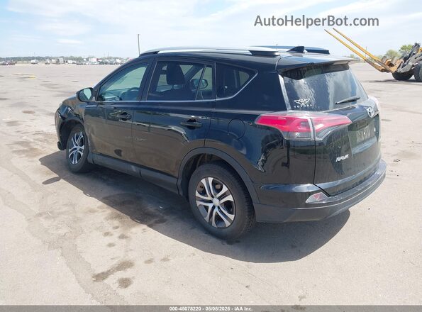 2T3BFREV2GW418808 2016 TOYOTA LE Black Trasero izquierdo