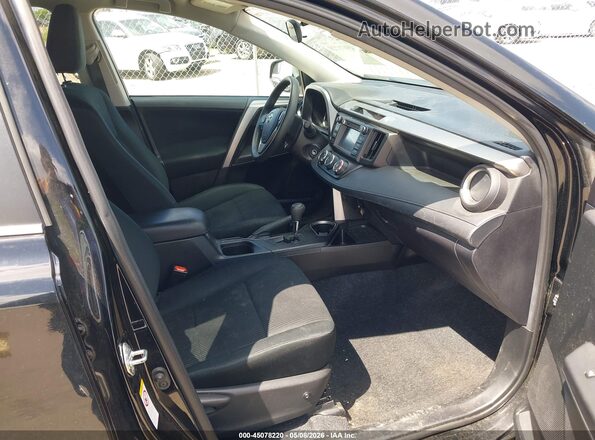 2T3BFREV2GW418808 2016 TOYOTA LE Black Vista interior delantera
