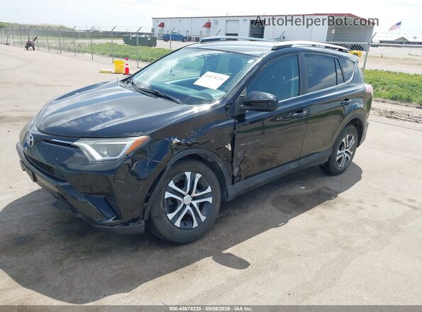 2T3BFREV2GW418808 2016 TOYOTA LE Black Vista tres cuartos delantera izquierda