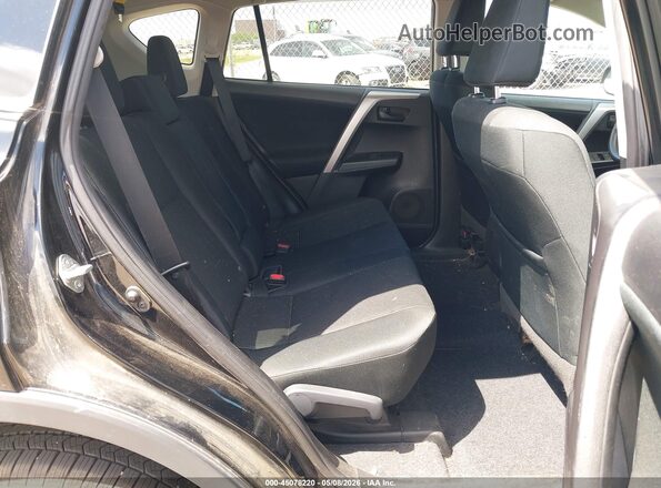 2T3BFREV2GW418808 2016 TOYOTA LE Black Vista de la etiqueta del VIN