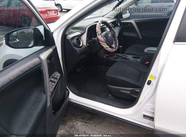 2T3BFREV2HW629900 2017 TOYOTA RAV4 White Front interior view