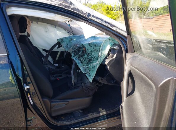 2T3BFREV4JW768786 2018 TOYOTA LE Teal Widok wnętrza z przodu