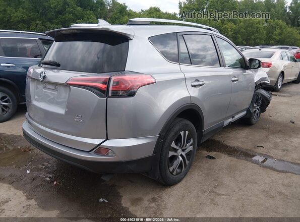 2T3BFREV5GW445551 2016 TOYOTA LE Silver Հետևի աջ