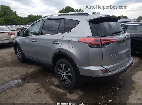 2T3BFREV5GW445551 2016 TOYOTA LE Silver Հետևի ձախ