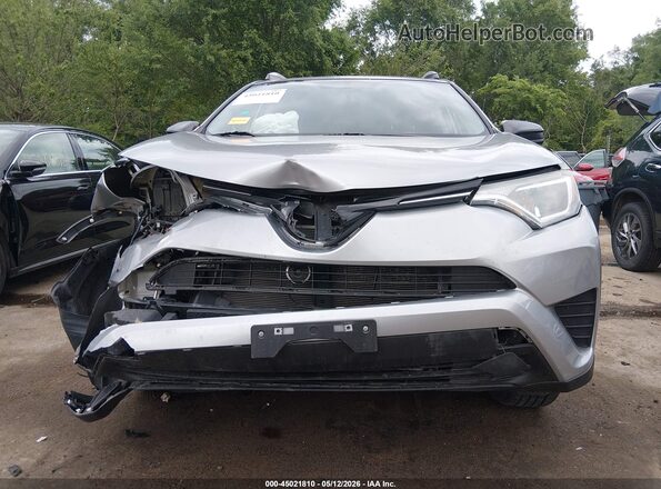 2T3BFREV5GW445551 2016 TOYOTA LE Silver 