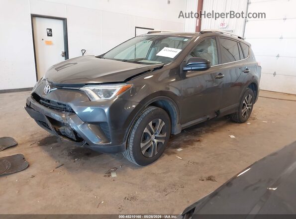 2T3BFREV6GW411151 2016 TOYOTA RAV4 Gray Vista tres cuartos delantera izquierda