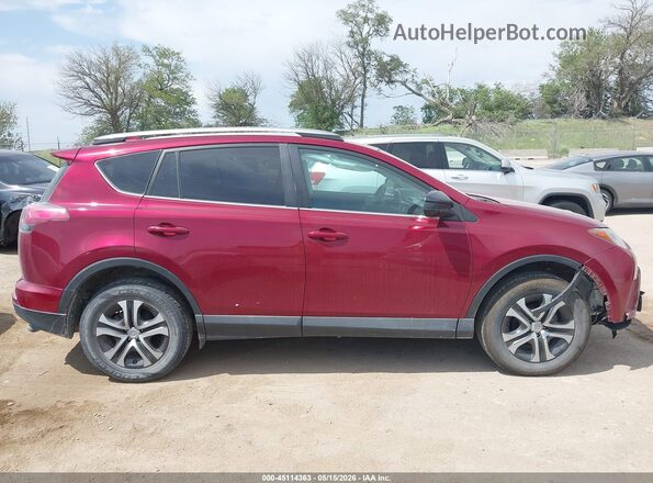 2T3BFREV6JW749768 2018 TOYOTA RAV4 Maroon Rear interior view