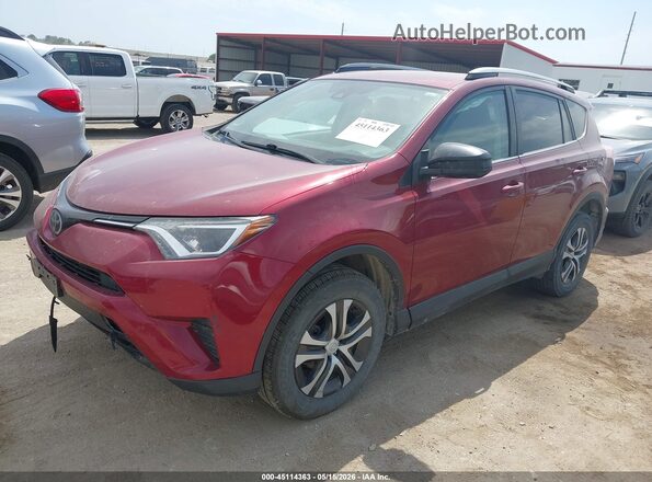 2T3BFREV6JW749768 2018 TOYOTA RAV4 Maroon Front left