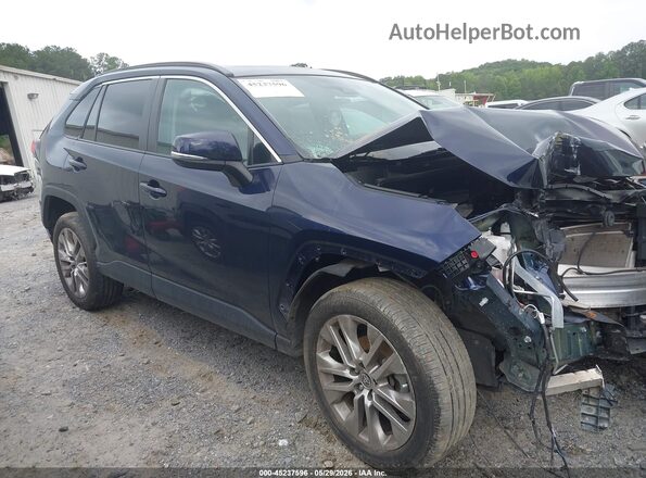 2T3C1RFV5PW296236 2023 TOYOTA RAV4 Blue Widok wnętrza z tyłu