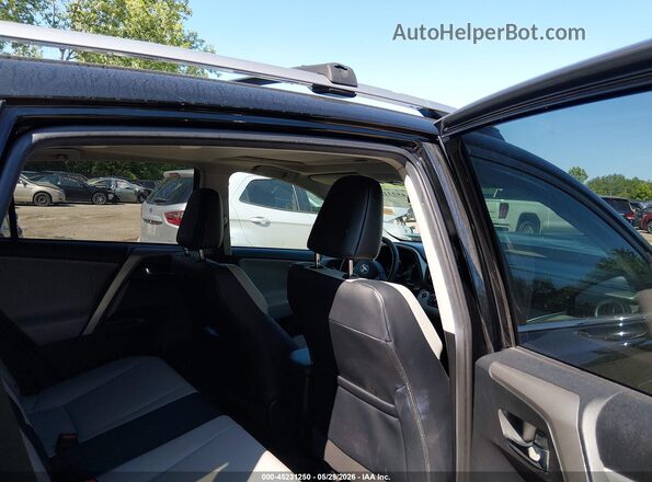 2T3DFREV0JW755672 2018 TOYOTA RAV4 Black VIN კოდის სტიკერის ხედი