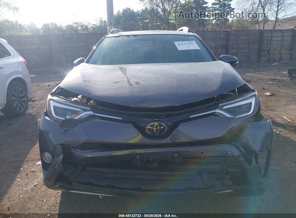 2T3DFREV1HW546046 2017 TOYOTA RAV4 Gray Սալոնի հետևի տեսք