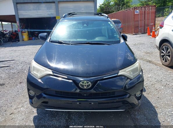 2T3DFREV6GW496131 2016 TOYOTA RAV4 Black Սալոնի հետևի տեսք