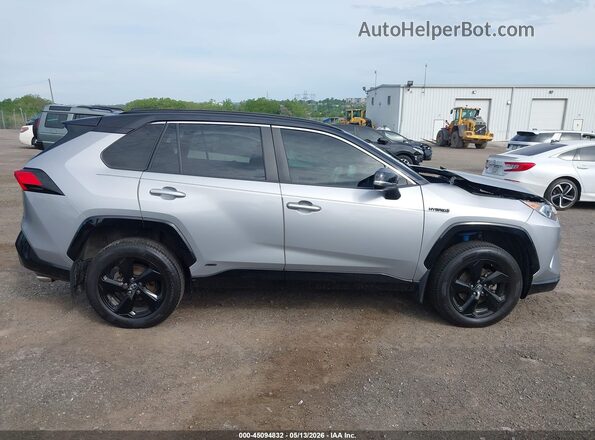 2T3E6RFV3MW010261 2021 TOYOTA RAV4 HYBRID Серебряный Вид задней части салона