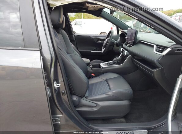 2T3E6RFV3RW047172 2024 TOYOTA RAV4 HYBRID Gray Widok wnętrza z przodu