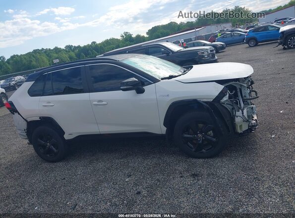 2T3E6RFV4MW015890 2021 TOYOTA RAV4 HYBRID White Rear interior view