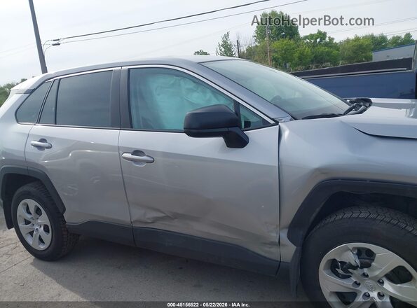 2T3F1RFV0PW404758 2023 TOYOTA RAV4 Silver Rear interior view