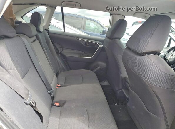 2T3G1RFV2MC163934 2021 TOYOTA LE White Vista de los asientos traseros