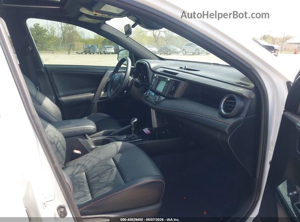 2T3JFREV4HW581148 2017 TOYOTA RAV4 White Front interior view