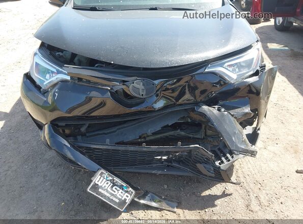 2T3JFREV7GW430335 2016 TOYOTA RAV4 Black Widok z przodu