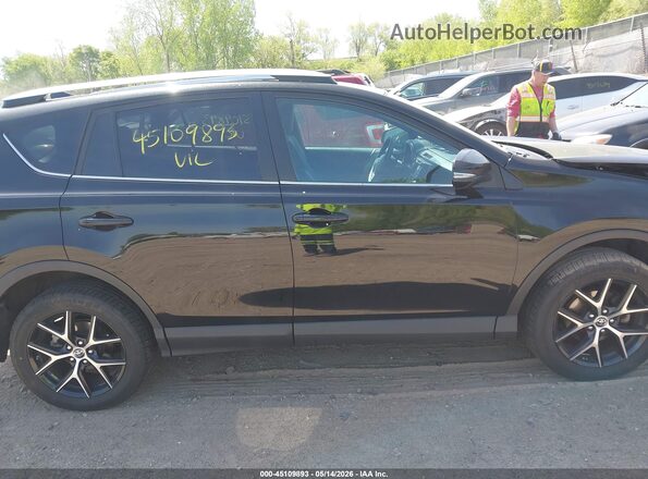2T3JFREV7GW430335 2016 TOYOTA RAV4 Black Widok wnętrza z tyłu