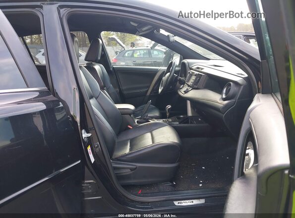 2T3JFREV7GW516907 2016 TOYOTA RAV4 Black Front interior view