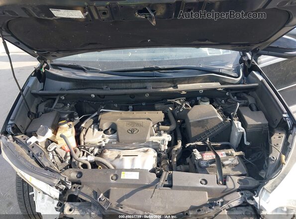 2T3JFREV7GW516907 2016 TOYOTA RAV4 Black Rear view