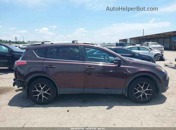 2T3JFREV7GW517149 2016 TOYOTA RAV4 Maroon Vista interior trasera