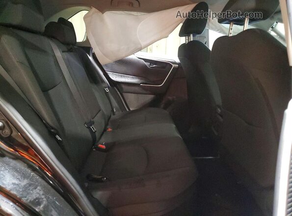 2T3MWRFV0RW193850 2024 TOYOTA RAV Black Vista interior trasera