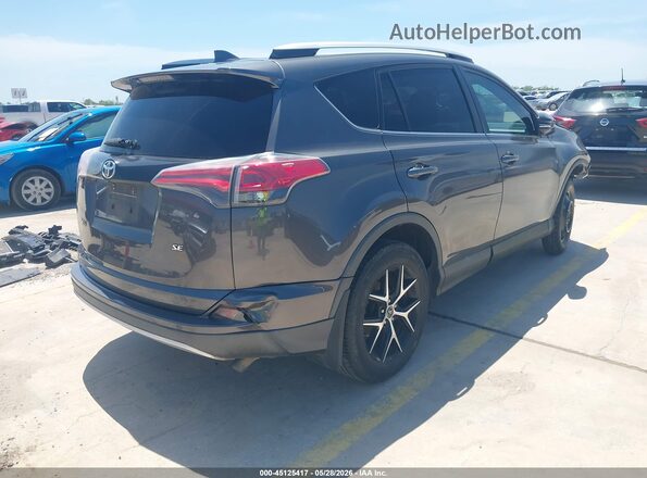 2T3NFREV8GW298283 2016 TOYOTA RAV4 Gray Rear right