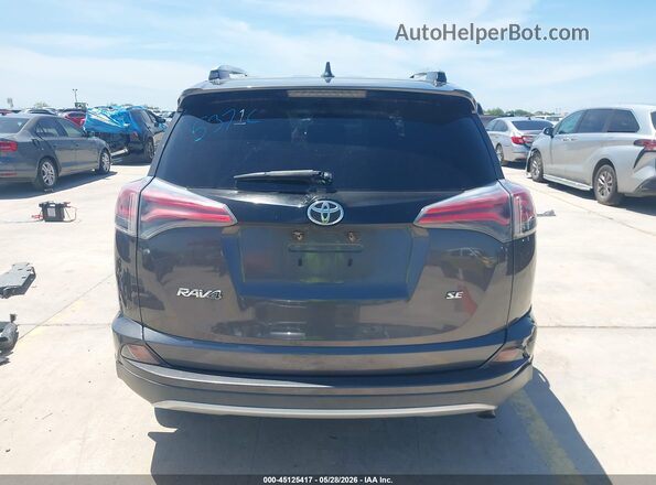 2T3NFREV8GW298283 2016 TOYOTA RAV4 Gray 