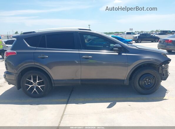 2T3NFREV8GW298283 2016 TOYOTA RAV4 Gray 360 interior view