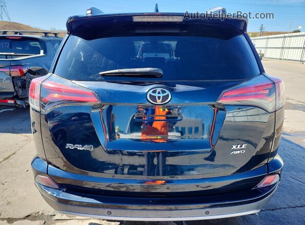 2T3RFREV1HW651028 2017 TOYOTA RAV4 Blue Widok z tyłu