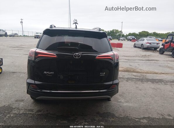 2T3RFREV2JW779042 2018 TOYOTA RAV4 Black 