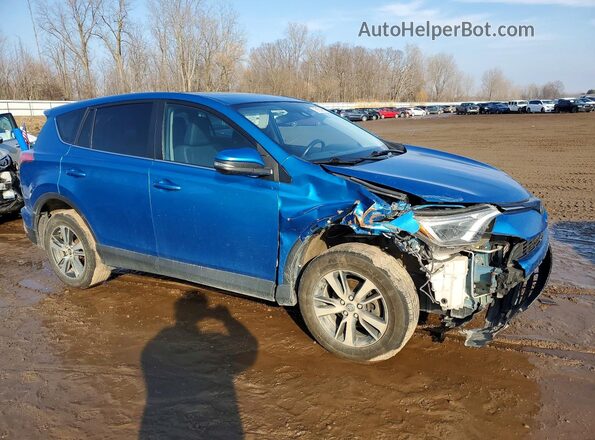 2T3RFREV3JW797968 2018 TOYOTA RAV4 Blue Front right