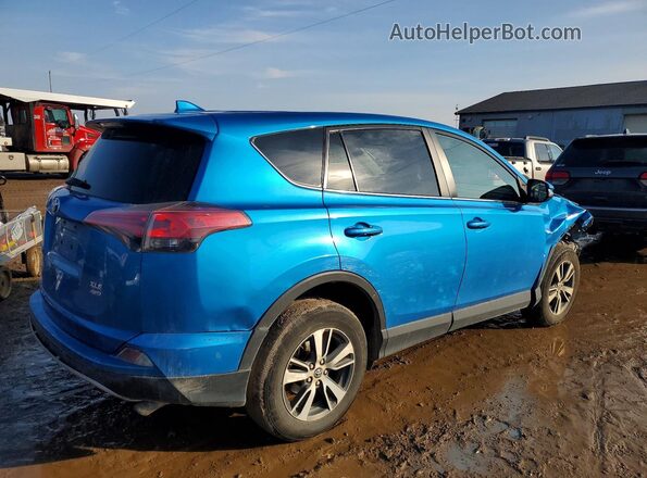 2T3RFREV3JW797968 2018 TOYOTA RAV4 Blue Rear right