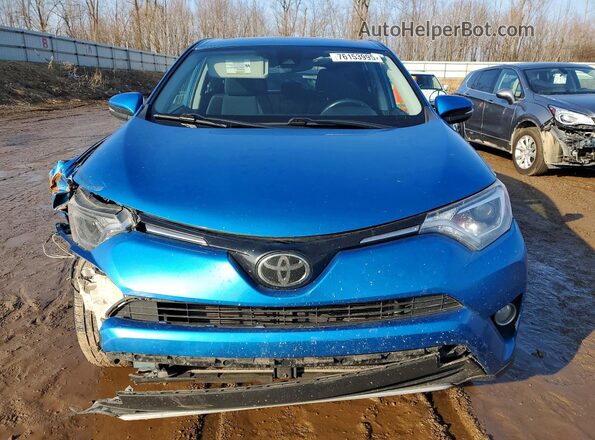 2T3RFREV3JW797968 2018 TOYOTA RAV4 Blue Front view