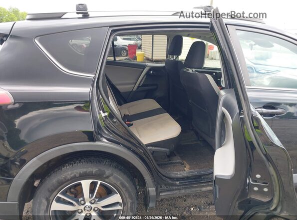2T3RFREV3JW839345 2018 TOYOTA RAV4 Black Vista de la etiqueta del VIN