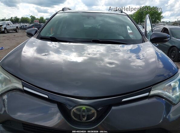 2T3RFREV4JW704164 2018 TOYOTA RAV4 Gray 