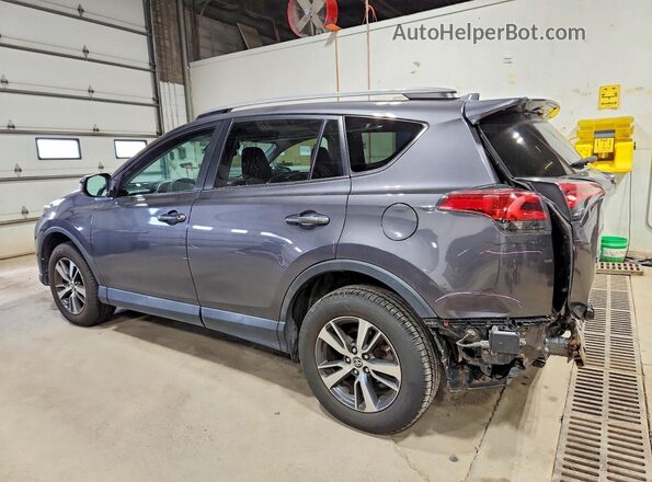 2T3RFREV4JW747189 2018 TOYOTA LE Gray Rear left