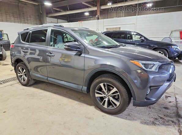 2T3RFREV4JW747189 2018 TOYOTA LE Gray Front right