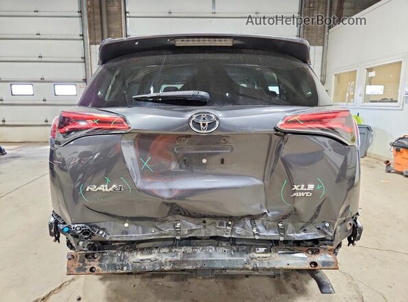 2T3RFREV4JW747189 2018 TOYOTA LE Gray Rear view