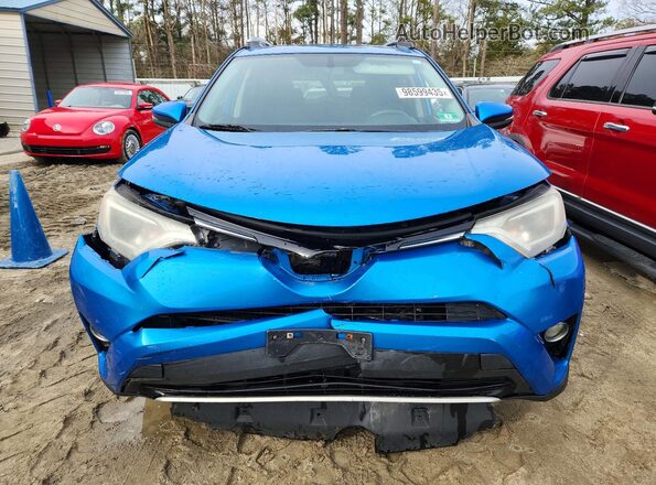 2T3RFREV5GW486552 2016 TOYOTA RAV4 Blue Front view
