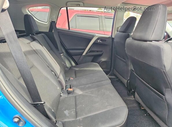 2T3RFREV5GW486552 2016 TOYOTA RAV4 Blue Rear interior view