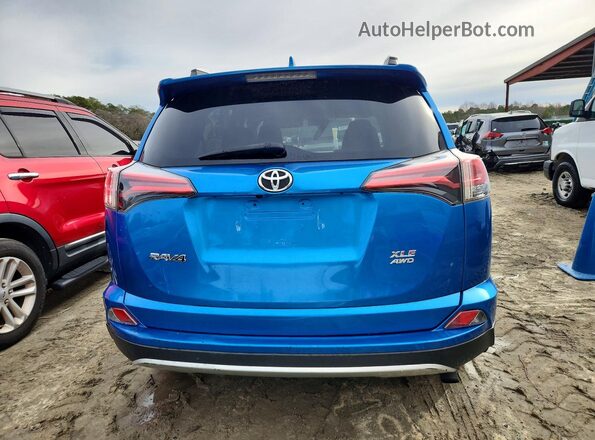 2T3RFREV5GW486552 2016 TOYOTA RAV4 Blue Rear view