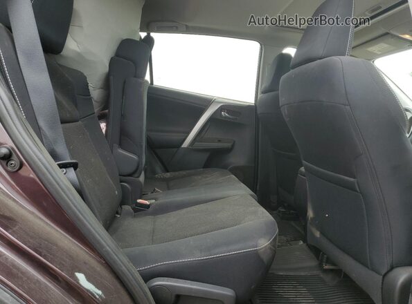 2T3RFREV5GW506802 2016 TOYOTA LE Burgundy Rear interior view